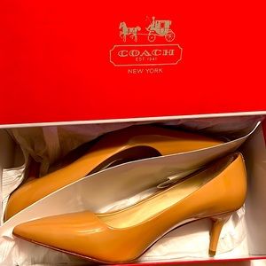 NEVER WORN COACH PATENT LEATHER PUMPS. Size9.5 color: Light Camel. 2”Heel